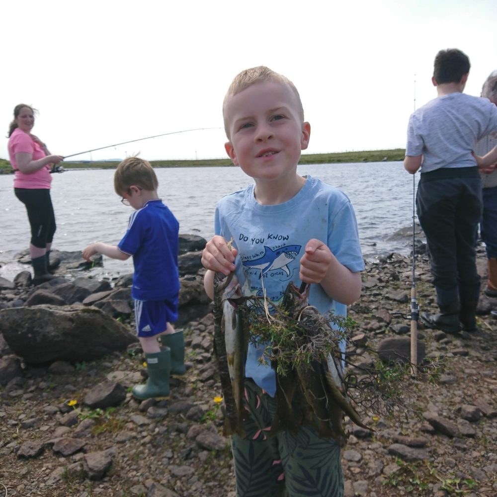 6 year old Calum John Macritchie with his catch